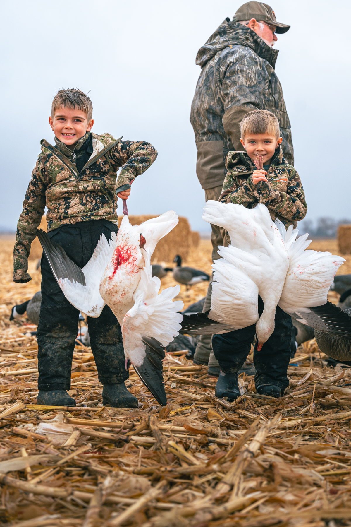 Guide and retriever with a mallard on a western Nebraska duck hunt